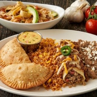 Pick 3 Combo: Choose any 3 items: Seasoned ground beef, chicken tinga, or Dos XX tacos; Cheese, seasoned ground beef, or chicken tinga enchiladas; Chicken flautas; beef or chicken empanadas; Chicken Tortilla Soup or house salad. Served with Mexican rice and choice of beans.